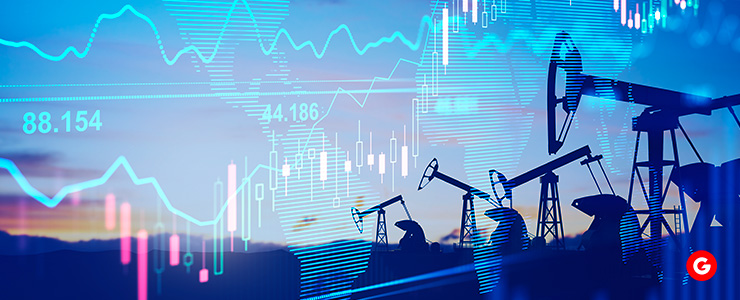 Oil pumps and stock market graphs showing economic trends.